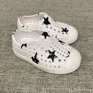 Native size 5 VGUC White and Black Star Slip-On Shoes